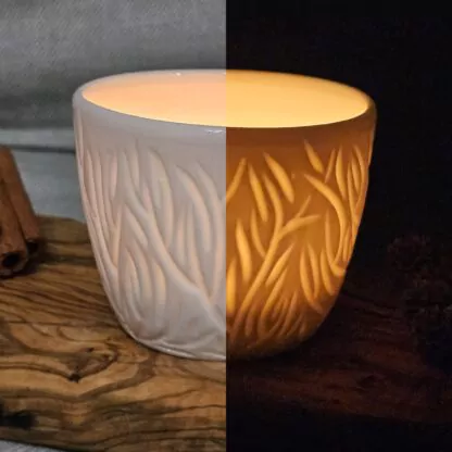 Porcelain luminary with carvings